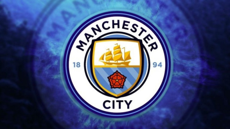 huy hiệu và màu áo của Manchester City